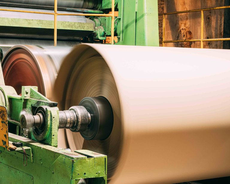 Paper Cutting Machine At Paper Mill. Detail